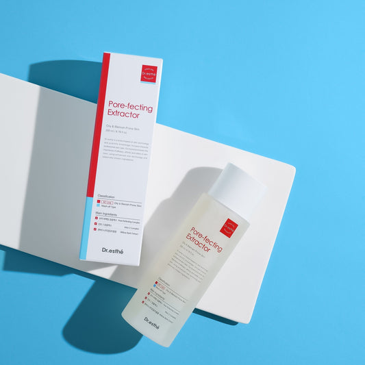 Dr. Esthe Pore-Fecting Extractor bottle and packaging on a blue background