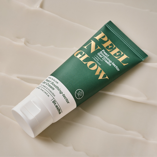 Green tube of 'Peel N Glow' cream on a beige textured background